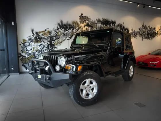 Carro 4.0 SPORT 4X4 TETO LONA 6I 12V GASOLINA 2P AUTOMÁTICO